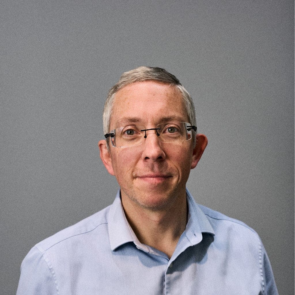 Robert Nixon, Managing Director of Ritehome, in a light blue shirt against a plain grey background